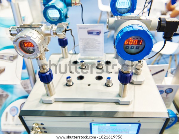 Automatic\
pressure calibrator at an industrial\
exhibition