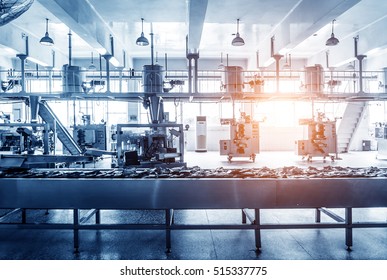 Automatic Production Line In The Factory Packing Workshop, Blue Tint Map.