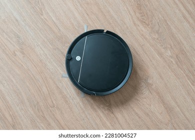 automatic remote house cleaning, robot cleaner at home on the floor