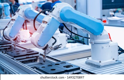 Automatic Robot In A Smart Factory. Assembly Line
