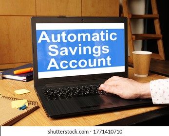 Automatic Savings Account Is Shown On The Conceptual Business Photo