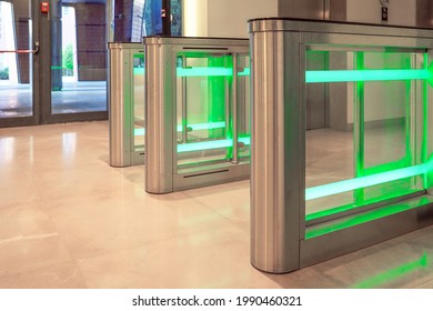 Automatic Security Gateway And Electronic Card Reader. Electronic Card Reader At Office Security Gate. Automatic Security Turnstiles With Card Reader In A Corporate Office Building