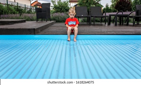 Automatic Swimming Pool Covering System, Safely Protect Children And Pets From Accidental Contact With Water, Home And Cottage Equipment, Copyspace, Place For Text, Outdoor Exterior, Soft Focus