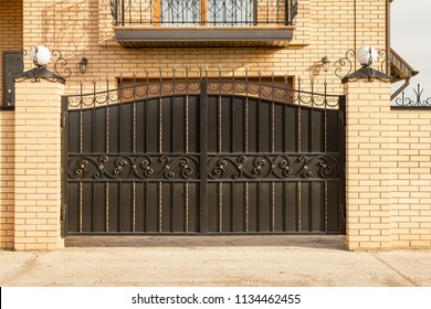 Automatic Swing Gates With Forged Elements In A Private House