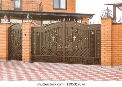 Automatic Swing Gates With Forged Elements In A Private House