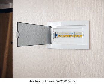Automatic switches lined up on a distribution panel in an apartment or house. Modern safety technologies.