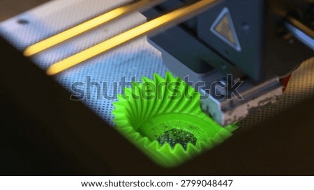 Automatic three-dimension 3d printer Printing a yellow plastic drinking cup