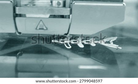 Automatic three-dimension 3d printer Printing a yellow plastic drinking cup