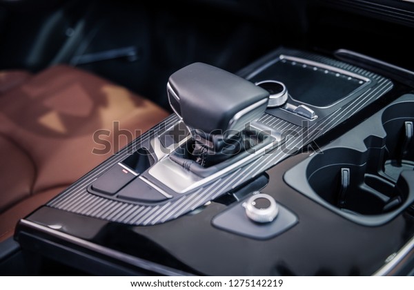 Automatic transmission. Close\
up of speed automatic transmission in nice comfortable passenger\
car