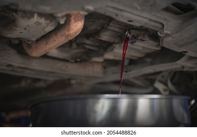 Automatic Transmission Fluid Drains Out Of The Transmission Oil Pan.