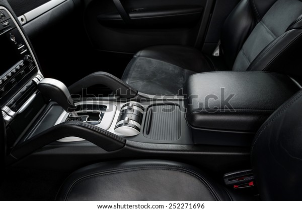 Automatic transmission gear shift. Modern car\
interior detail.