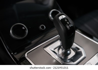 An automatic transmission gearbox inside a luxury car