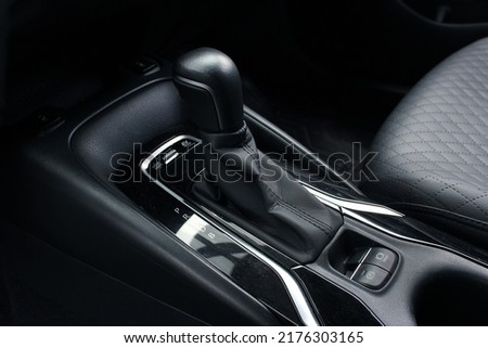Automatic transmission gearshift stick, Closeup a manual shift of modern car gear shifter. Close up of the automatic gearbox lever, black interior car.