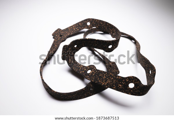 Automatic transmission oil pan gasket.\
auto parts for auto undercarriage on gray\
background