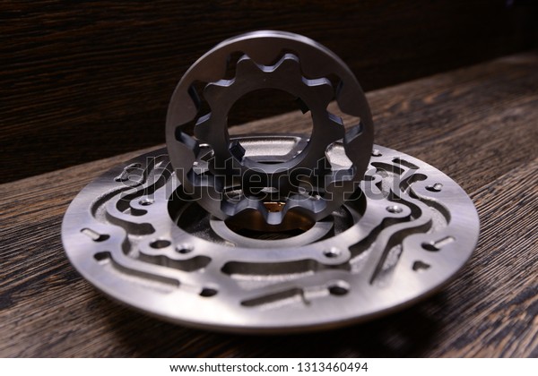 Automatic\
transmission oil pump on wooden\
background