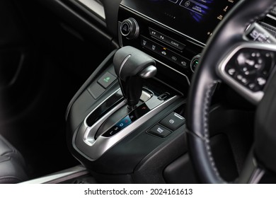automatic transmission shift selector in the car interior. Closeup a manual shift of modern car gear shifter.