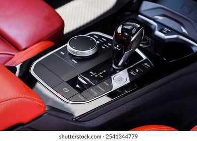 automatic transmission shift selector in the car interior. Closeup a manual shift of modern car gear shifter. 4x4 gear shift