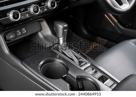 automatic transmission shift selector in the car interior. Closeup a manual shift of modern car gear shifter. 4x4 gear shift	