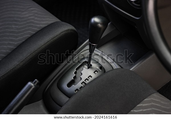automatic transmission\
shift selector in the car interior. Closeup a manual shift of\
modern car gear\
shifter.
