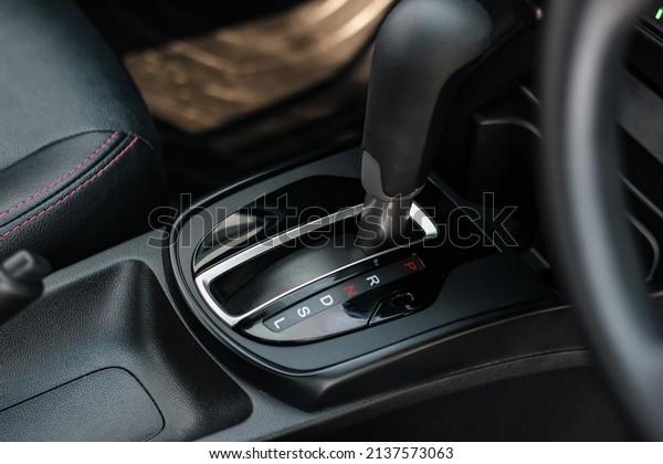 automatic transmission\
shift selector in the car interior. Closeup a manual shift of\
modern car gear\
shifter.