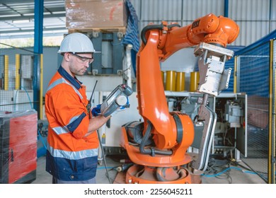Automation Engineer Service Programming Robotic Arm. New Era Modern Machine Automatic Manufacturing Industry Concept.