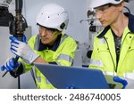 automation machine engineer students study and inspection control robot arm machine in robotics engineering academy at university or factory workshop. AI robot technology, future innovation trend.