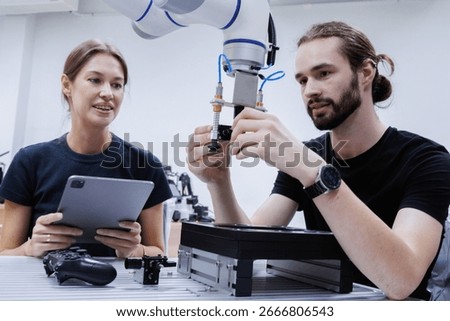 automation machine engineer students study and inspection control robot arm machine in robotics engineering academy at university or factory workshop. AI robot technology, future innovation trend.
