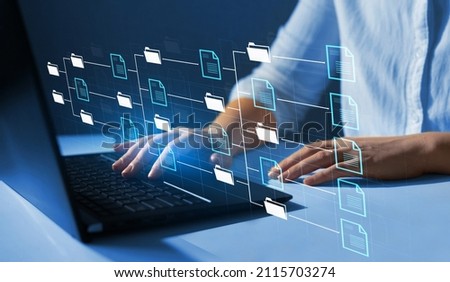 Automation software to archiving and efficiently manage and information files.Document Management System or DMS.Consultant information technology (IT) working on laptop.Internet Technology Concept.  Foto d'archivio © 