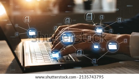 Automation software to archiving and efficiently manage and information files. Document Management System or DMS.Consultant information technology (IT) working on laptop.Internet Technology Concept. 