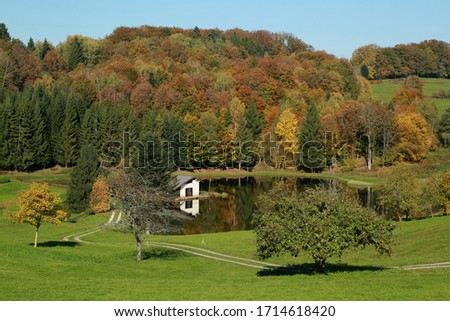 automn colors and waterreflection landscape in France