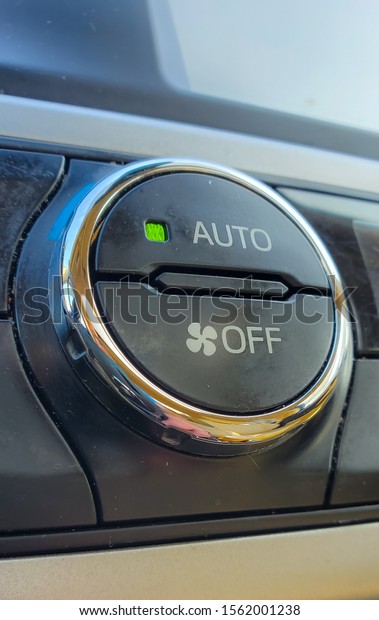 Automobile Air Conditioner, AC and Heater Auto, On\
and Off Button