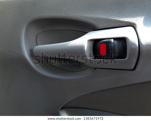 \
Automobile car door handle and glass sliding\
buttons
