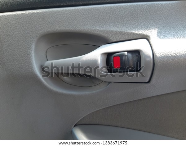 \
Automobile car door handle and glass sliding\
buttons