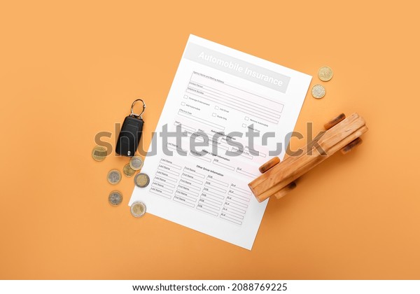 Automobile insurance with key and car figure\
on color background