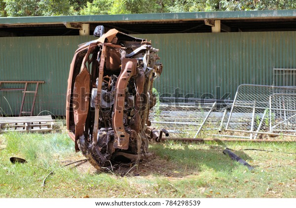 Automobile at\
junk yard. Old car metal in junk\
yard