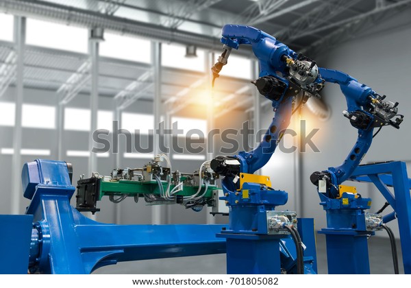 Automobile\
manufacturing production industrial machine , factory robot arm in\
smart factory and industry 4.0 concept.\
