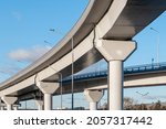 Automobile overpass on concrete supports. New road infrastructure. Preventing traffic jams
