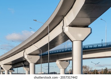 Automobile overpass on concrete supports. New road infrastructure. Preventing traffic jams - Shutterstock ID 2057317442