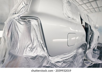 Automobile in paint-spraying booth of repair workshop - Powered by Shutterstock