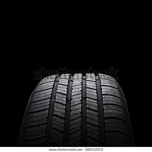 automobile\
rubber tires isolated on black\
background