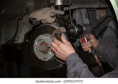 automobile wheel repair in car service - Powered by Shutterstock