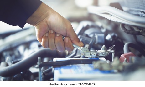 Automobile,auto Mechanics Working In Repair Service Garage. Repair Service Center Concept, Expert Repair Technicians In Modern Service Centers.