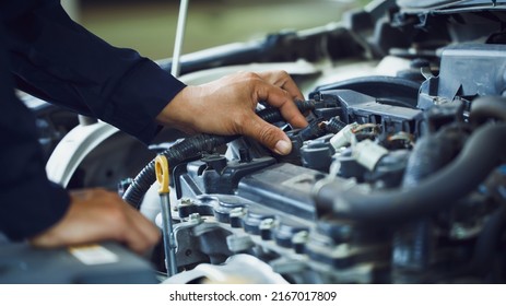 Automobile,machine,Auto Mechanics Working In Repair Service Garage. Repair Service Center Concept, Expert Repair Technicians In Modern Service Centers.