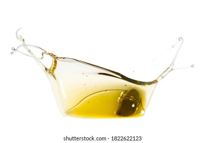 Automotive Engine Oil (lubricating Oil, Yellow Liquid Oil) Splash And Isolated On White Background. High Viscosity Of Base Oil. Maintenance, Service, And Energy Fuel Concept. 