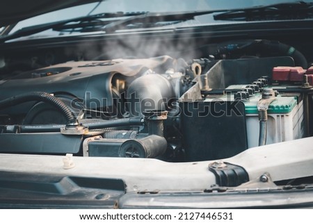 Automotive engine overheating on the road