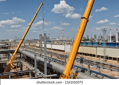 Automotive Heavy Lift Crane Is Unfolded On The Installation Of A Chemical Factory In The Time Of Repair