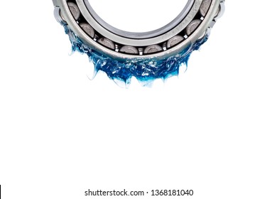 Automotive and Industrial close up grease, Blue Lithium (NLGI 3) bright grease put on bearing and isolated on white background with clipping path - Shutterstock ID 1368181040