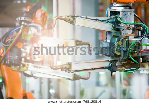 Automotive\
manufacturing plant arm welding\
details
