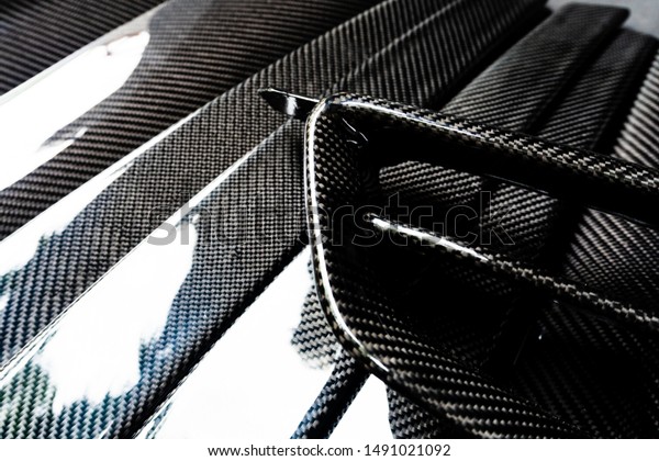 automotive part product make by\
carbon fiber composites. product of motorcycle and car. Cover\
part
