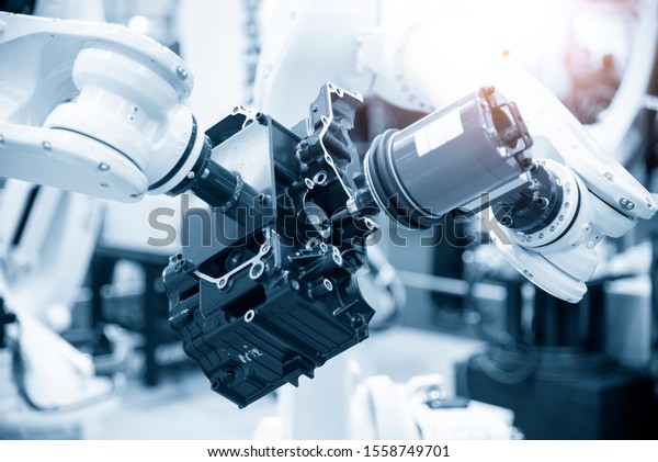 The automotive parts finishing process by milling\
spindle attach at the robotic arm. The aluminium casting gearbox\
parts machining process by automatic  robotic system attach the\
milling spindle .